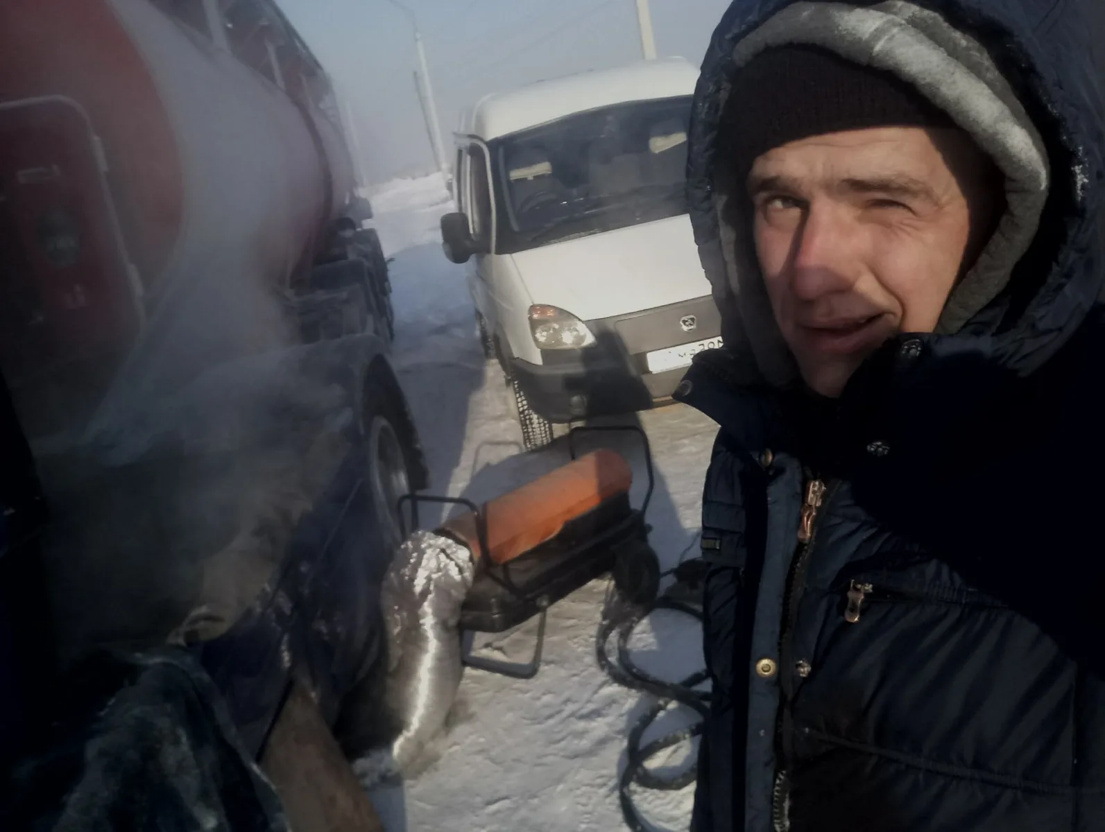 Мастер на выезде при отогреве грузовой техники